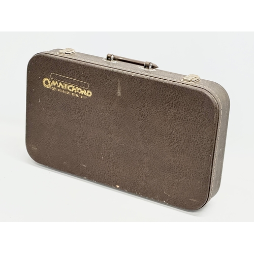 497 - A Suzuki Omnichord with case. 011968.