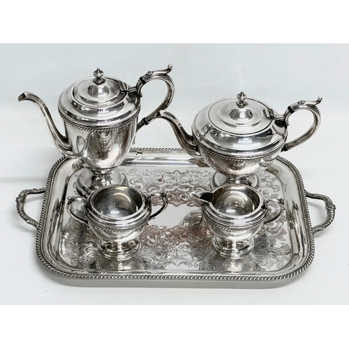 707 - A 5 piece Georgian style plated tea service. EP on copper. Tray measures 52x32.5cm.