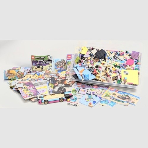 522 - A large collection of Lego with Lego manuals