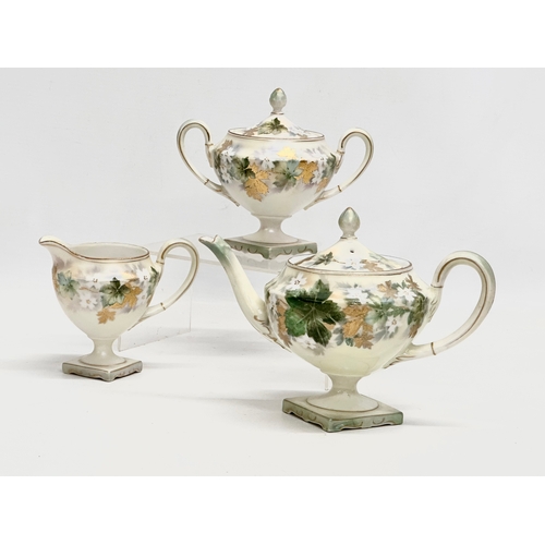 349 - A 3 piece R.S. Prussia porcelain tea service. Decorated with embossed gilt flowers and autumn leaves... 