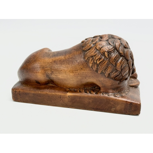 117 - A good quality carving of the Lion of Lucerne. 14x7x8cm