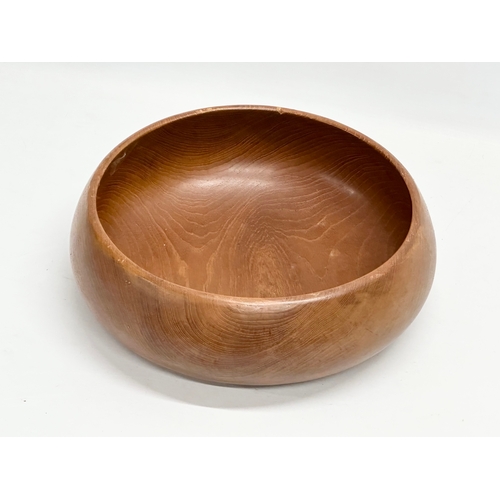 351 - A 1960’s Mid Century teak bowl. 30x11cm