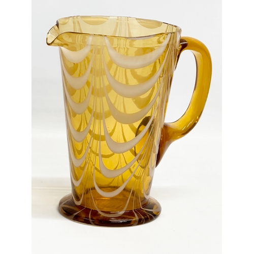 314 - A vintage Amber Glass pitcher jug with Milk Glass drapes. Circa 1930-1950. 19x12x19cm