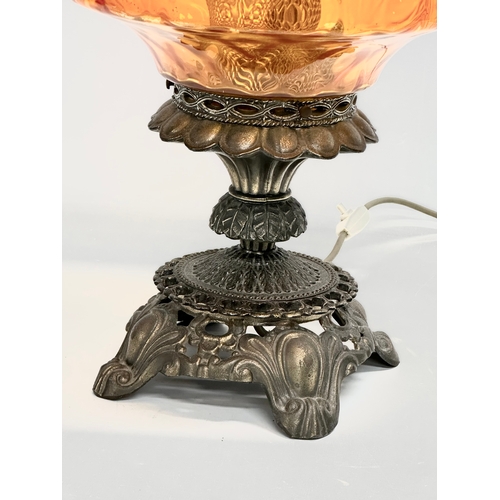 721 - A large ornate brass Falkenstein table lamp. 51cm