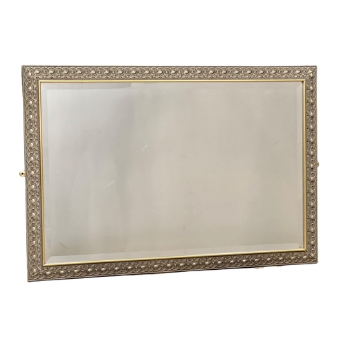 356B - An ornate framed Victorian style mirror. 96x65cm