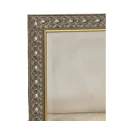 356B - An ornate framed Victorian style mirror. 96x65cm