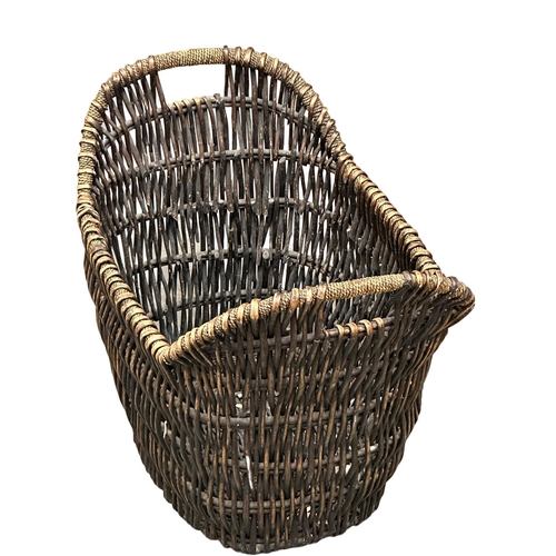 366A - A large good quality wicker basket. 65x47x56cm