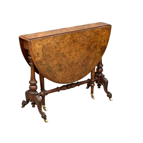 1174 - A large Victorian Burr Walnut sutherland table on carved base with cabriole legs. 109cmx92cmx73cm. C... 