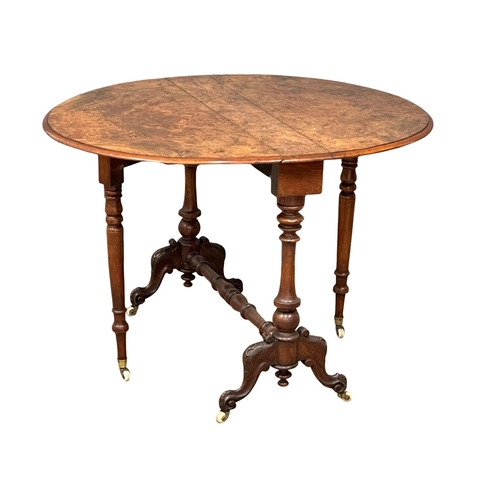 1174 - A large Victorian Burr Walnut sutherland table on carved base with cabriole legs. 109cmx92cmx73cm. C... 