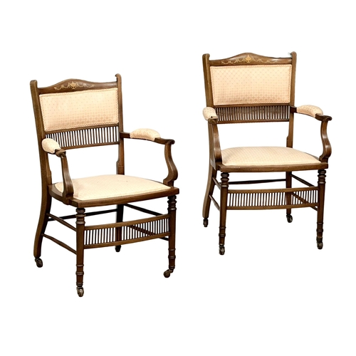 1175 - A pair of Edwardian inlaid Mahogany armchairs