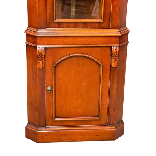 1177 - A large Victorian style Mahogany corner cabinet. 74cmx49cmx205cm.