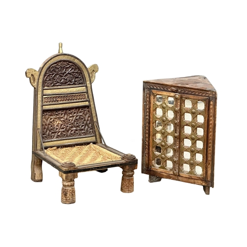 1181 - An early 20th Century Indian Pida chair and corner cabinet