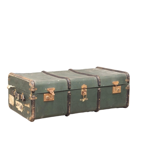 720 - A large vintage trunk with contents. 91x51x30cm