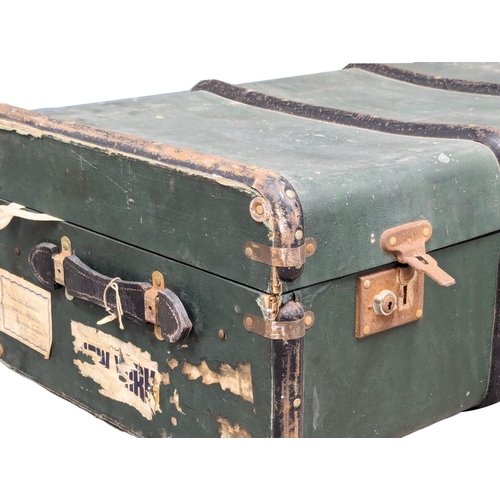 720 - A large vintage trunk with contents. 91x51x30cm