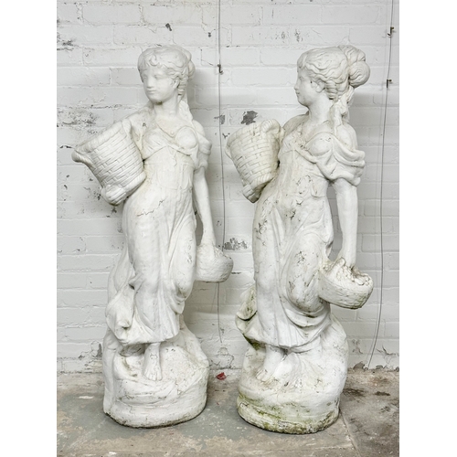 8 - A pair of large concrete garden figures. 135cm