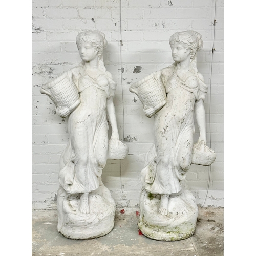 8 - A pair of large concrete garden figures. 135cm