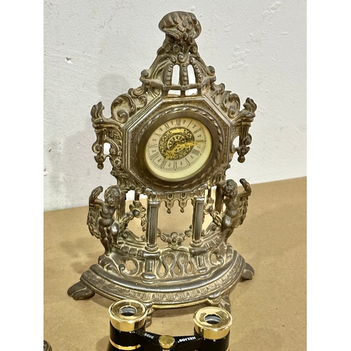 26 - A job lot including a brass clock, a pair of silver plated sprinkler vases, 2 small binoculars