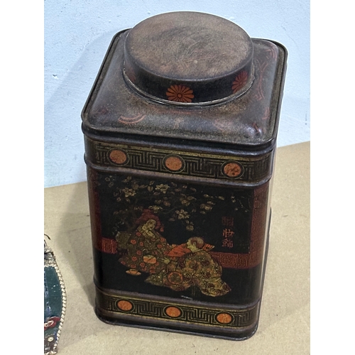 30 - A late 19th century tin canister and a vintage Middle Eastern style bottle. 17x17x30cm