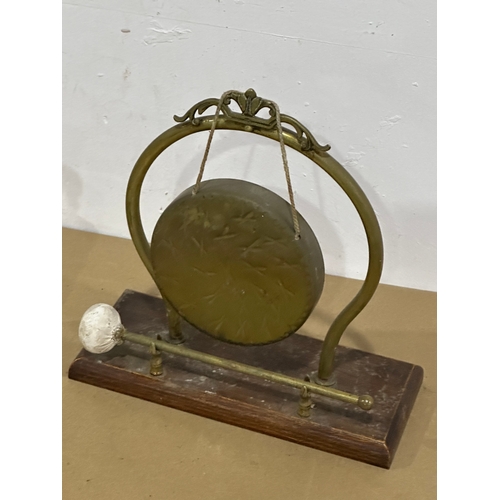 31 - An early 20th century brass gong and chemist bottle. 22cm. 30x12x32cm