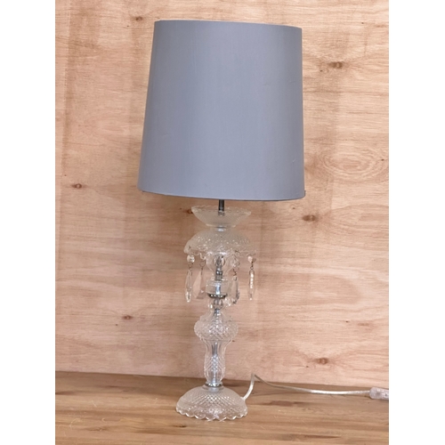 72 - A glass table lamp. 64cm