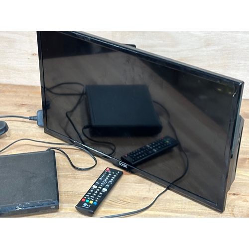 73 - A Logik tv with wall bracket. 24”