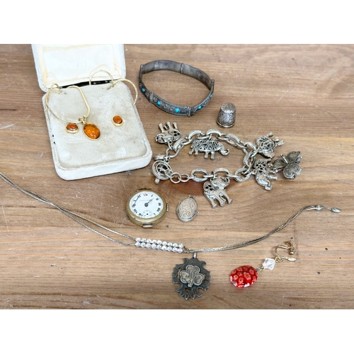 88 - A collection of jewellery. A silver pendant, a silver thimble, a bracelet stamped Pandora etc