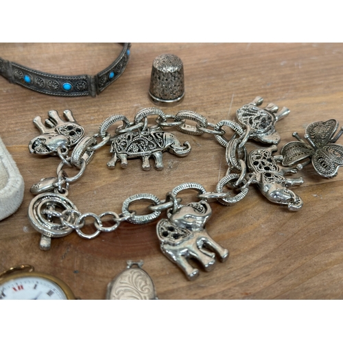 88 - A collection of jewellery. A silver pendant, a silver thimble, a bracelet stamped Pandora etc