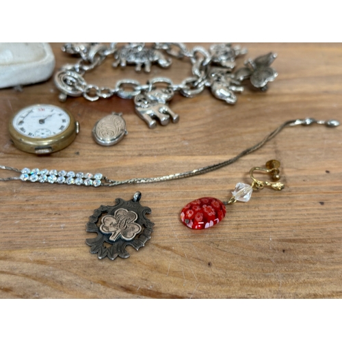 88 - A collection of jewellery. A silver pendant, a silver thimble, a bracelet stamped Pandora etc