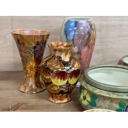 140 - A collection of vintage lustre bowls and vases. A West German jardiniere, a Pansy Faces bowl Regal P... 