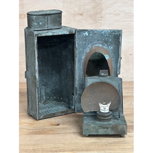 141 - A 1920’s Kelvin Bottomlay & Baird LTD railway lamp. 13x28cm