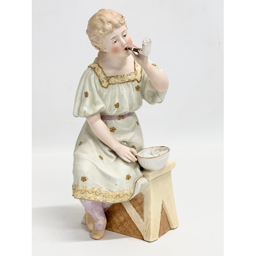 66 - A pair of late 19th century Heubach bisque ‘Bubbles’ figures. Circa 1890. 23cm