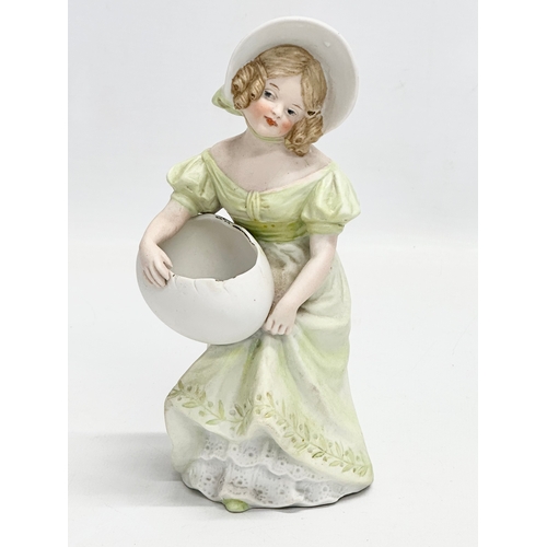 67 - A late 19th century Heubach bisque figurine. 19cm.