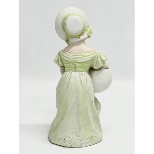 67 - A late 19th century Heubach bisque figurine. 19cm.