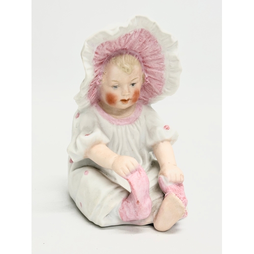 71 - 3 late 19th century Heubach bisque baby figurines. 10x14cm