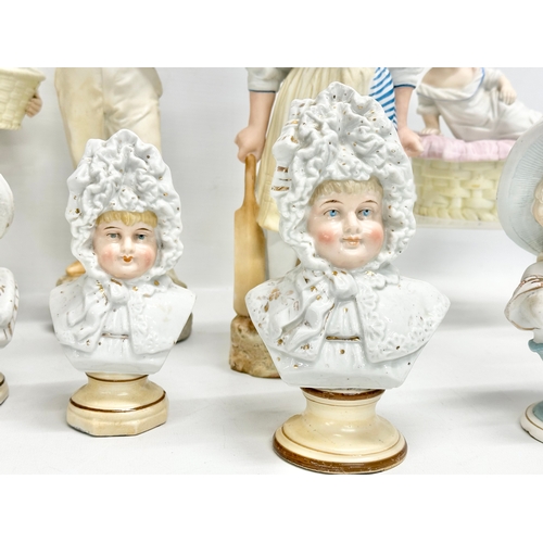 72 - A collection of late 19th century German bisque figurines. Largest pair 32cm