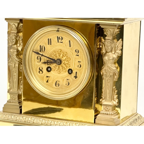 7 - A late 19th century French brass mantle clock on stand. L. Marti Medaille D’Argent 1889. With key an... 