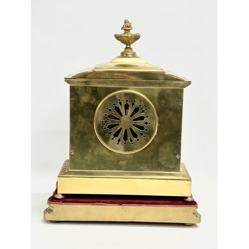 7 - A late 19th century French brass mantle clock on stand. L. Marti Medaille D’Argent 1889. With key an... 