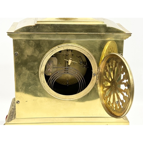 7 - A late 19th century French brass mantle clock on stand. L. Marti Medaille D’Argent 1889. With key an... 