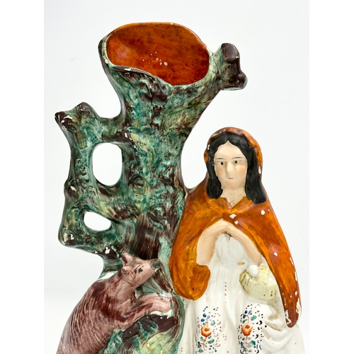 9 - A large mid 19th century Staffordshire ‘Little Red Riding Hood’ spill vase. 20x33.5cm