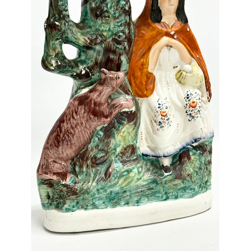 9 - A large mid 19th century Staffordshire ‘Little Red Riding Hood’ spill vase. 20x33.5cm