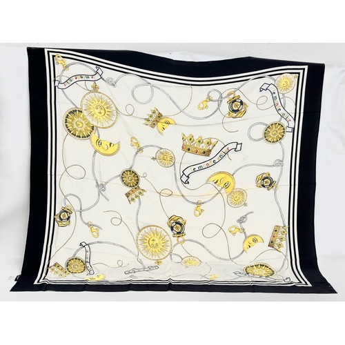 457 - A Louis Feraud ‘Le Monte Entier’ silk scarf.