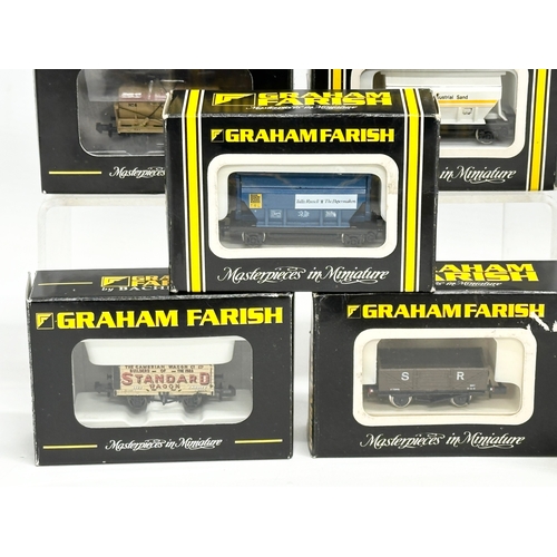 14 Graham Farish train carriages and wagons in boxes.