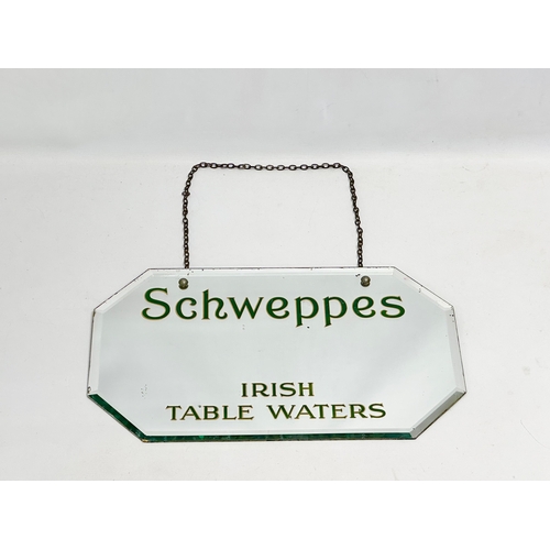 56 - An early 20th century Schweppes Irish Table Waters advertising bevelled mirror. 51x31cm