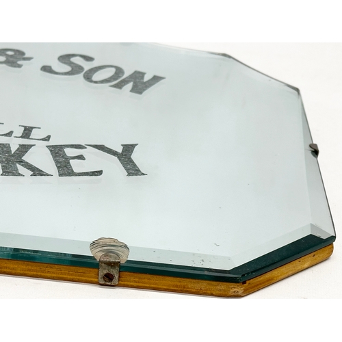 57 - An early 20th century John Jameson & Son (JJ&S) Dublin Whiskey advertising mirror. 61x36cm