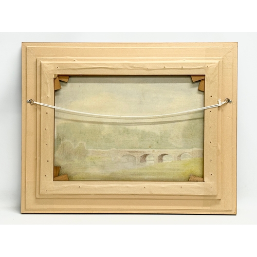 105 - A large oil painting on canvas by J. Edmund Wilson. River Through the Fields. 60x44.5cm. Frame 75x59... 