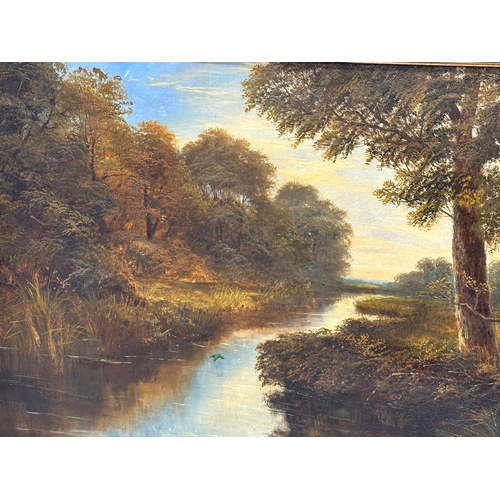 44 - A large oil painting on canvas by Charles Henry Passey (1818-1895) River Through the Forest. 91x59cm... 