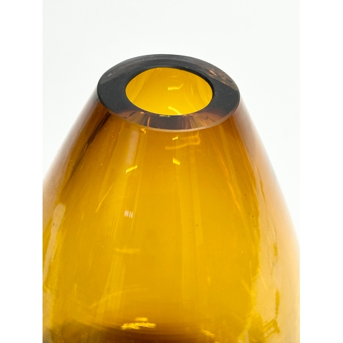 62 - A Swedish ‘Torpedo’ Amber Glass vase by Seda. 11x20.5cm