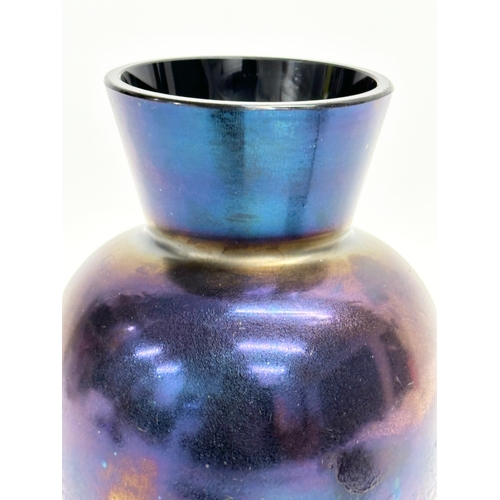 64 - An early 20th century iridescent glass vase by Kralik. Circa 1900. 10x16cm