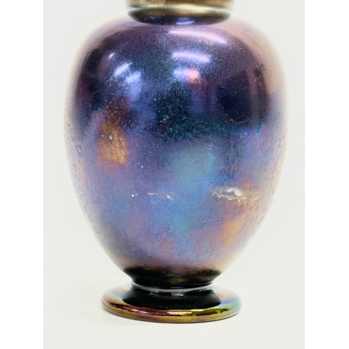 64 - An early 20th century iridescent glass vase by Kralik. Circa 1900. 10x16cm