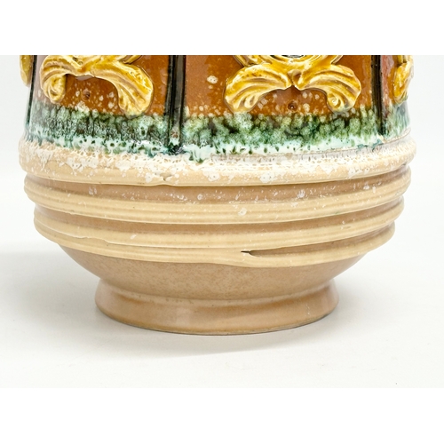 221 - A large Italian Majolica glazed pot. 18x31.5cm